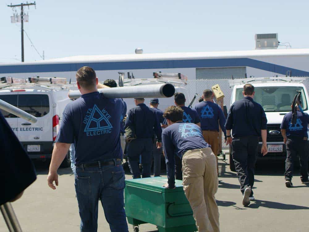 team of electricians working